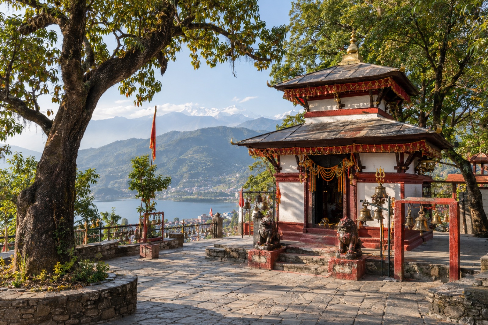 Bhadrakali Temple on its hilltop above Pokhara, with Phewa Lake and the Annapurna range beyond