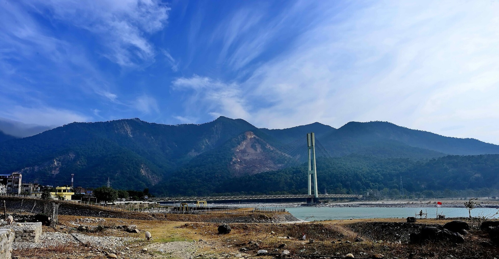 The cable-stayed Karnali Bridge at Chisapani spanning the Karnali River below the Churia hills, near Dhangadhi