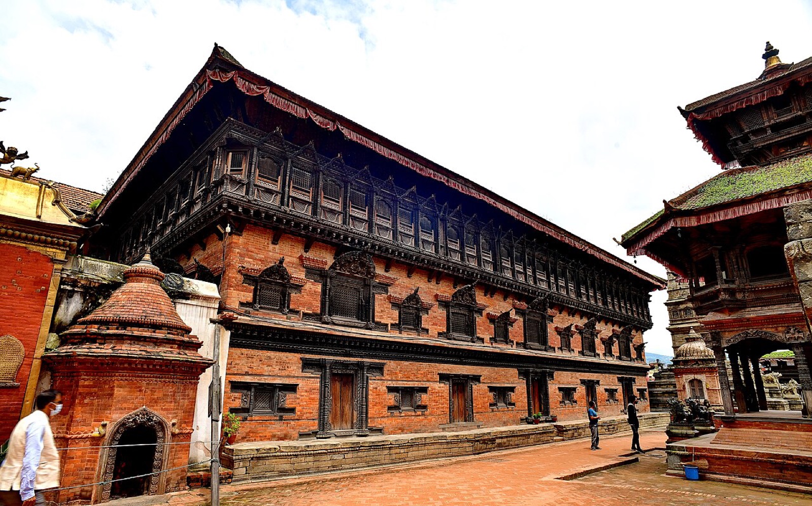 The carved dark-wood balcony of the 55-Window Palace on Bhaktapur Durbar Square