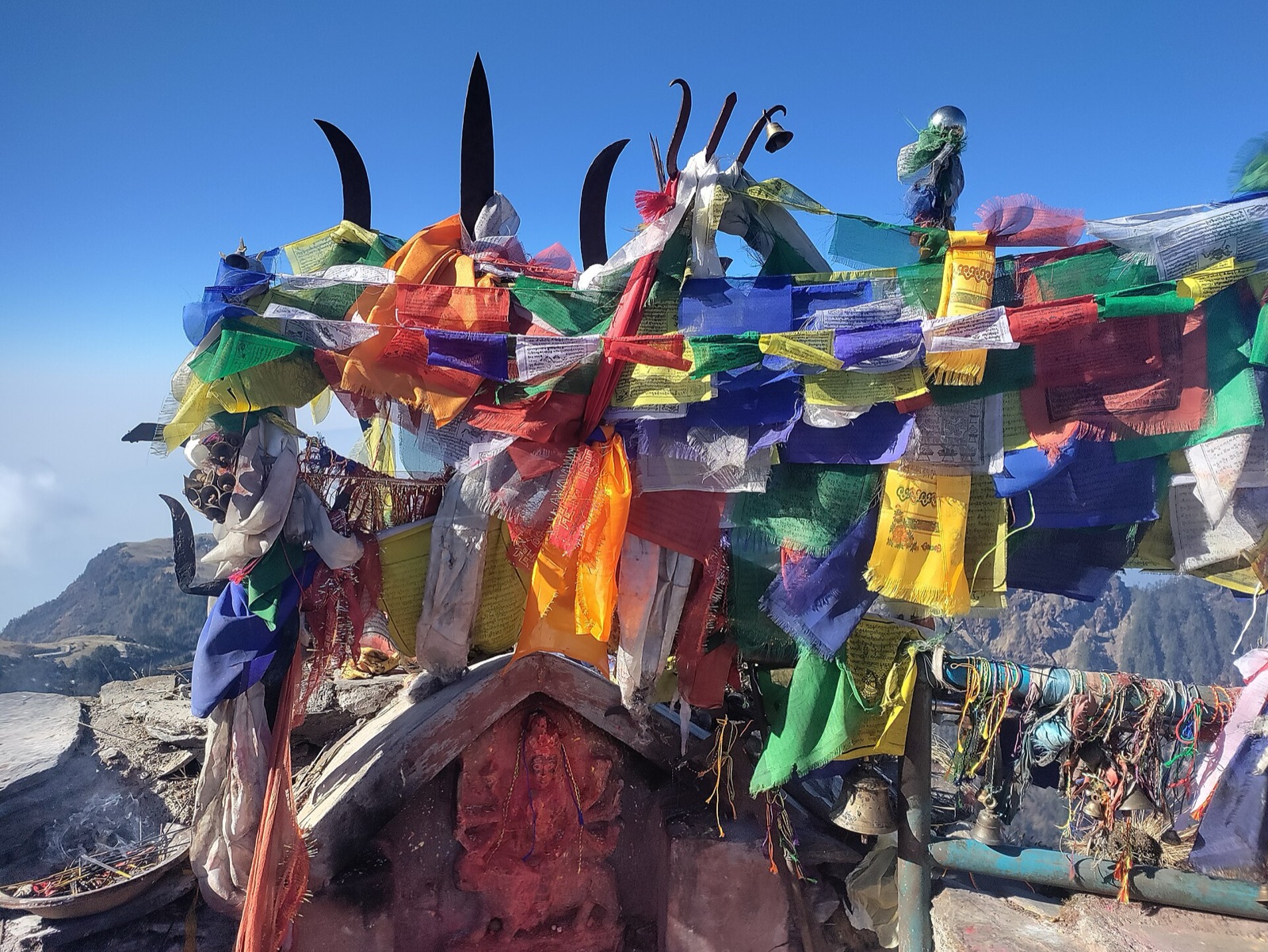 The Kalinchowk Bhagwati shrine on its summit, hung with prayer flags and iron tridents
