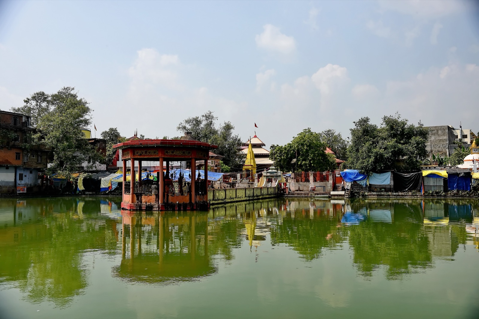 The Bageshwori Temple complex in Nepalgunj, with its red pavilion shrine standing in the temple pond
