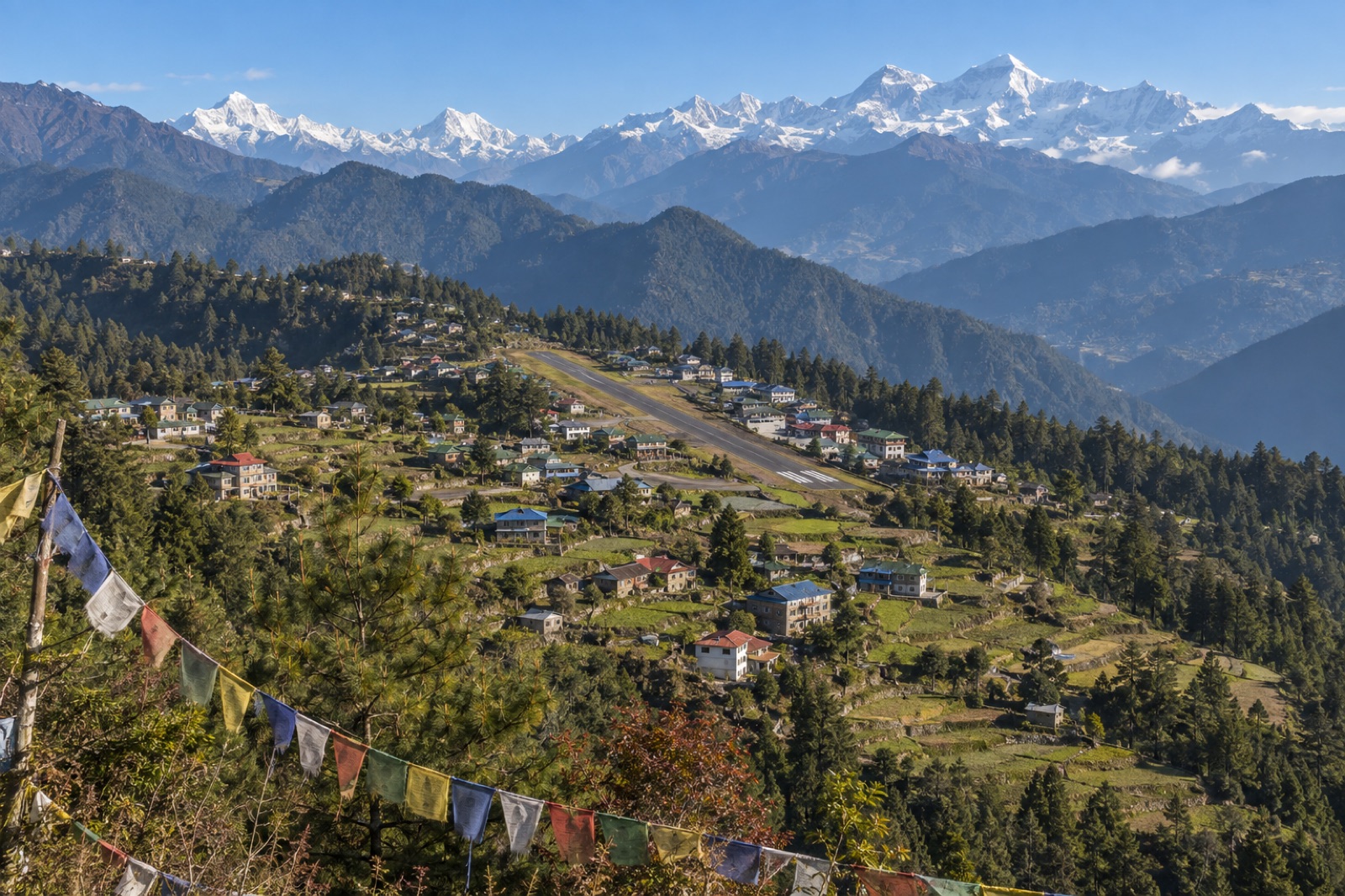 The Sherpa town of Phaplu in Solukhumbu with its ridge airstrip and Everest-region peaks on the horizon